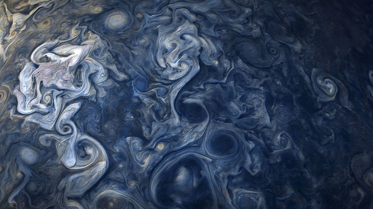 Estas impresionantes tormentas forman una cara diferente de Júpiter