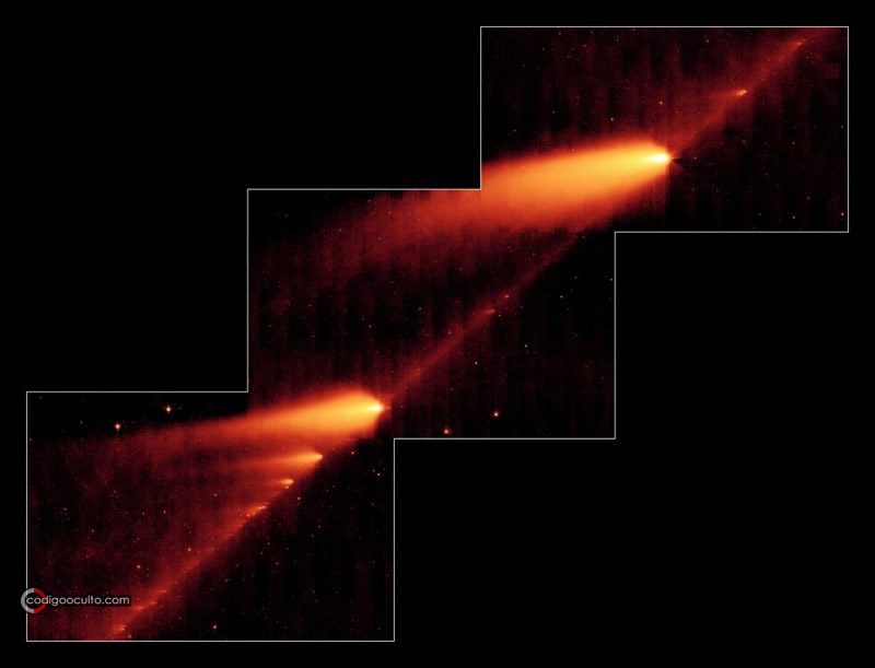 Esta imagen infrarroja del telescopio espacial Spitzer de la NASA muestra el cometa roto 73P/Schwassman-Wachmann 3 deslizándose a lo largo de un rastro de escombros dejados durante sus múltiples viajes alrededor del Sol. Los objetos parecidos a llamas son los fragmentos del cometa y sus colas, mientras que el polvoriento rastro del cometa es la línea que une los fragmentos
