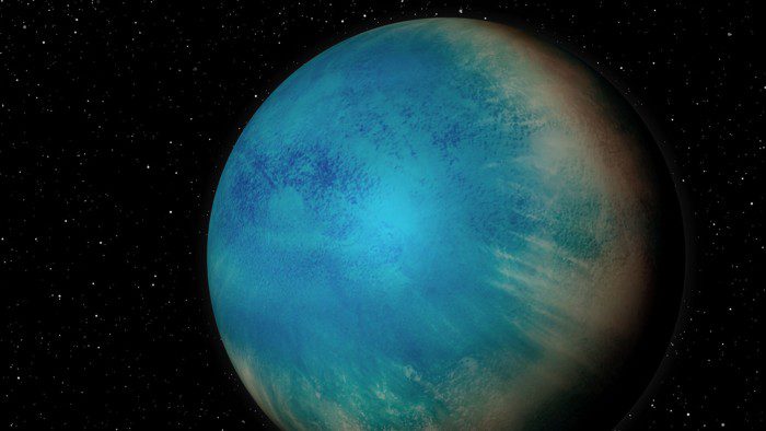 Representación artística del exoplaneta TOI-1452 b, un pequeño planeta que puede estar completamente cubierto por un océano profundo