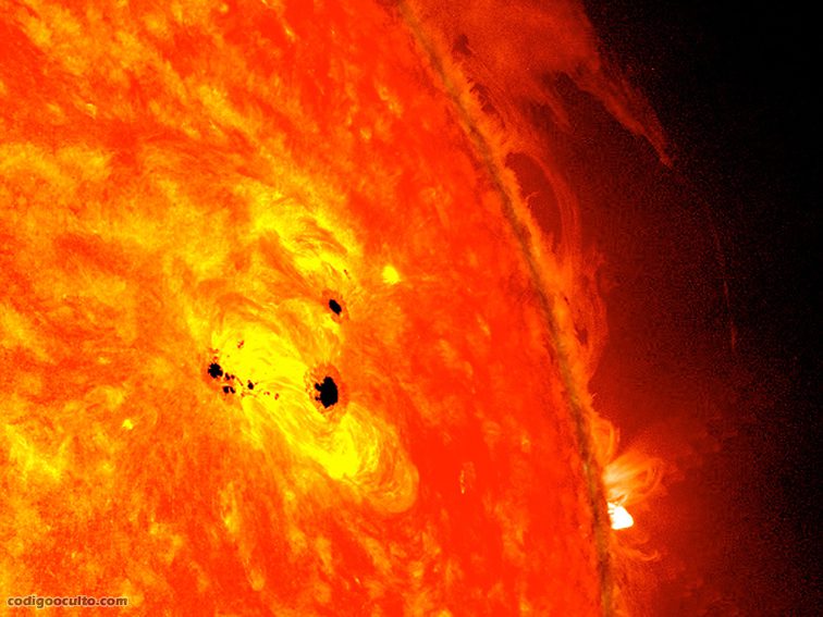 En esta imagen, puedes ver una región activa en el sol con manchas solares oscuras