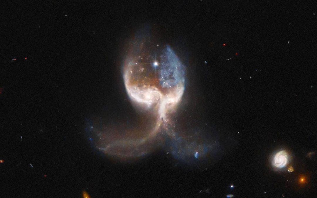 Las “alas de ángel” observadas por el Telescopio Hubble luego de un violento choque de galaxias